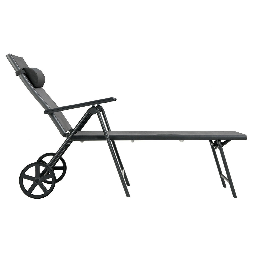 Gray patio lounge chair with wheels and neck pillow, side view showcasing adjustable backrest for versatile outdoor.
