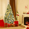 6-foot pre-lit snow flocked Christmas tree with 928 tips and metal stand, creating a warm festive atmosphere.