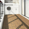 Acacia wood interlocking tile flooring in a laundry area, showcasing a rustic design and durable PVC base for drainage.