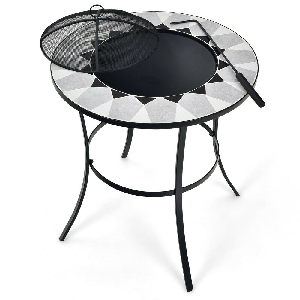 Round fire pit table with mesh cover and fire poker, featuring a durable steel frame and decorative patterns for.