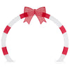 Christmas archway with large red bow and warm white LED lights, perfect for yards and gardens during the holiday season.