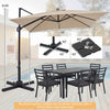 10 FT cantilever patio umbrella in beige with solar LED lights, providing shade for outdoor dining and relaxation.
