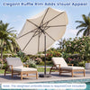 10 FT beige scalloped solar patio umbrella with 24 LED lights, shown tilted for optimal shade and visual appeal.