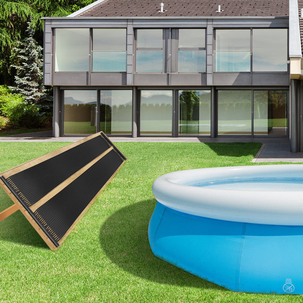 Weatherproof solar swimming pool heating system with PE material, placed on grass for efficient year-round heating.
