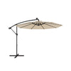 Beige 10 feet solar offset hanging umbrella with 40 lamp beads, adjustable tilt, and durable polyester fabric for.