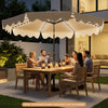 Beige 10 feet solar patio umbrella with color-changing LED lights, perfect for outdoor dining and evening ambiance.