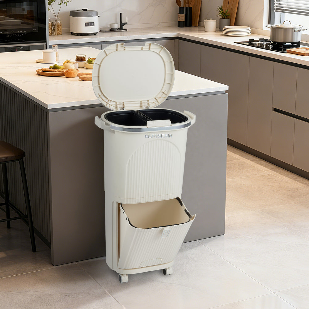 Beige 10-gallon kitchen trash can with dual buckets, push-top lid, and wheels for easy mobility and waste sorting.
