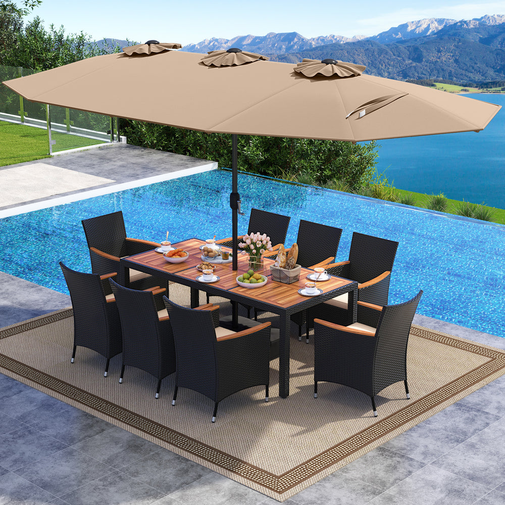 10-piece outdoor dining set featuring a brown acacia wood tabletop, padded chairs, and a large double-sided umbrella by.