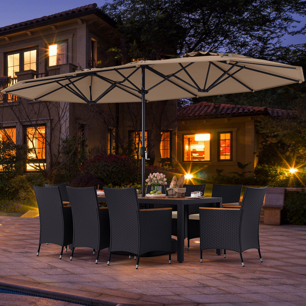 10-piece outdoor dining set featuring a brown rattan surface, acacia wood tabletop, and a large double-sided umbrella.