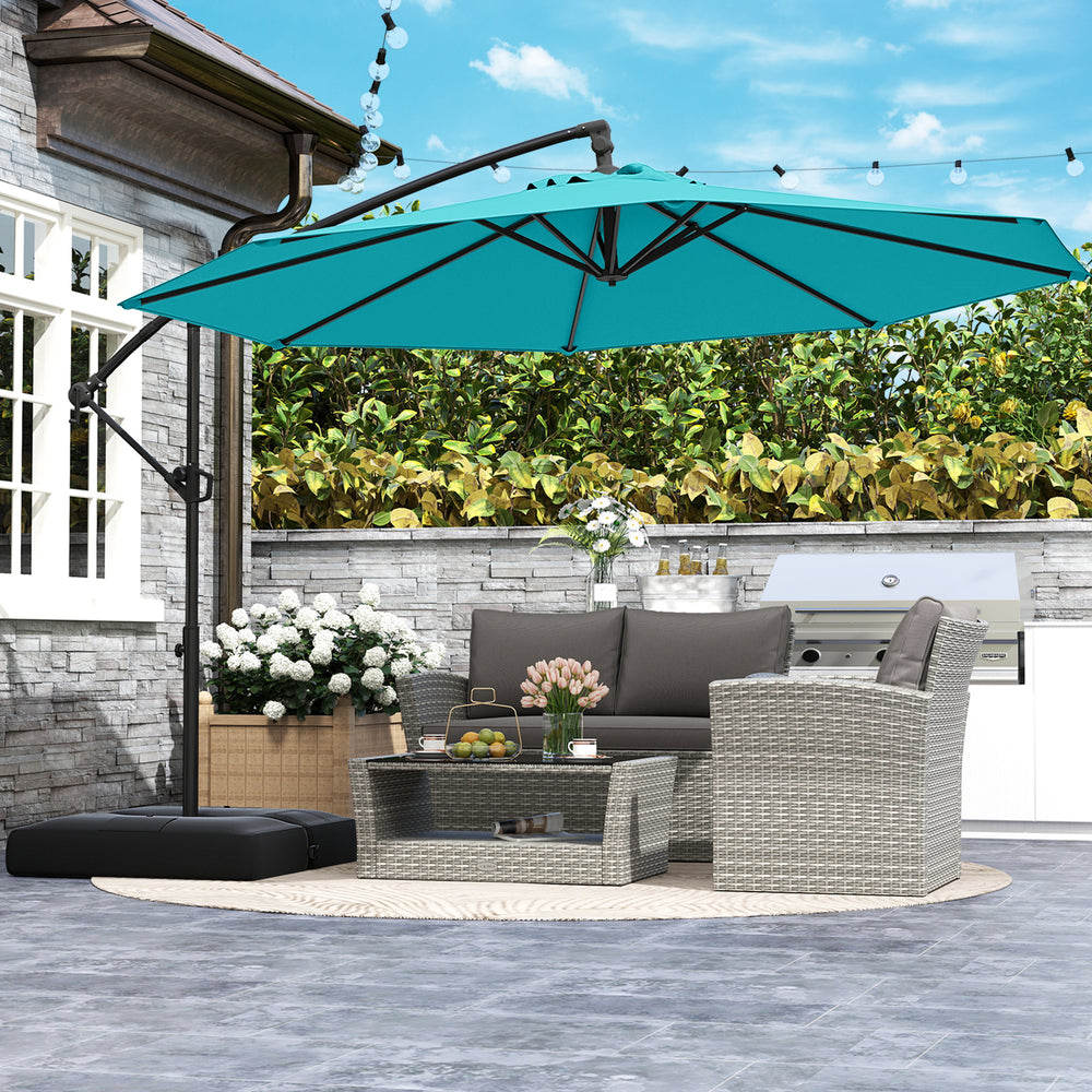 Turquoise 10 feet offset hanging umbrella with base, providing sun protection for outdoor patio relaxation.