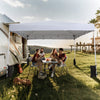 Pop up canopy tent in white, 10 x 10 feet, providing UPF50+ sun protection for outdoor gatherings and picnics.