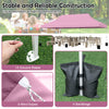 Pop-up canopy tent with pink oxford fabric, featuring ground stakes, wind ropes, and sandbags for outdoor events.