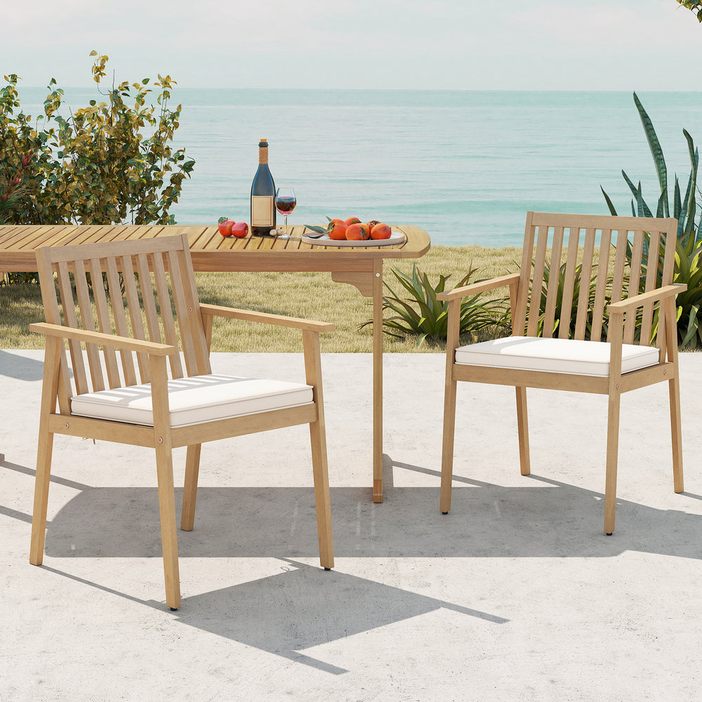 Two acacia wood patio dining chairs with removable cushions, perfect for outdoor relaxation on the porch or patio.