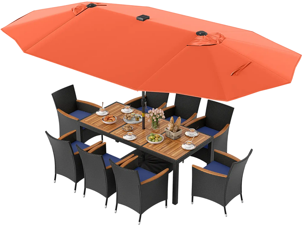 11-piece patio dining set featuring a large orange umbrella, navy cushions, and hand-woven PE rattan for outdoor dining.