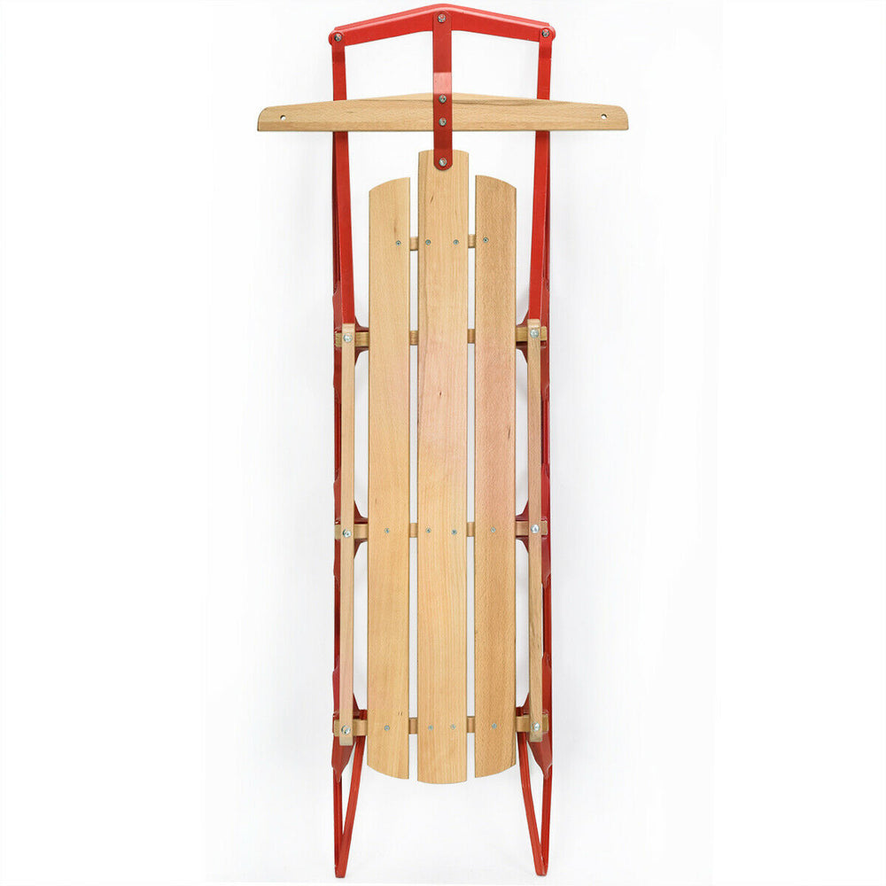 Kids wooden snow sled with metal runners, red frame, and steering bar for easy control and smooth sliding in snow.