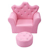 Pink kids sofa with a crown back design and plush ottoman, ideal for comfortable lounging in a children's room.