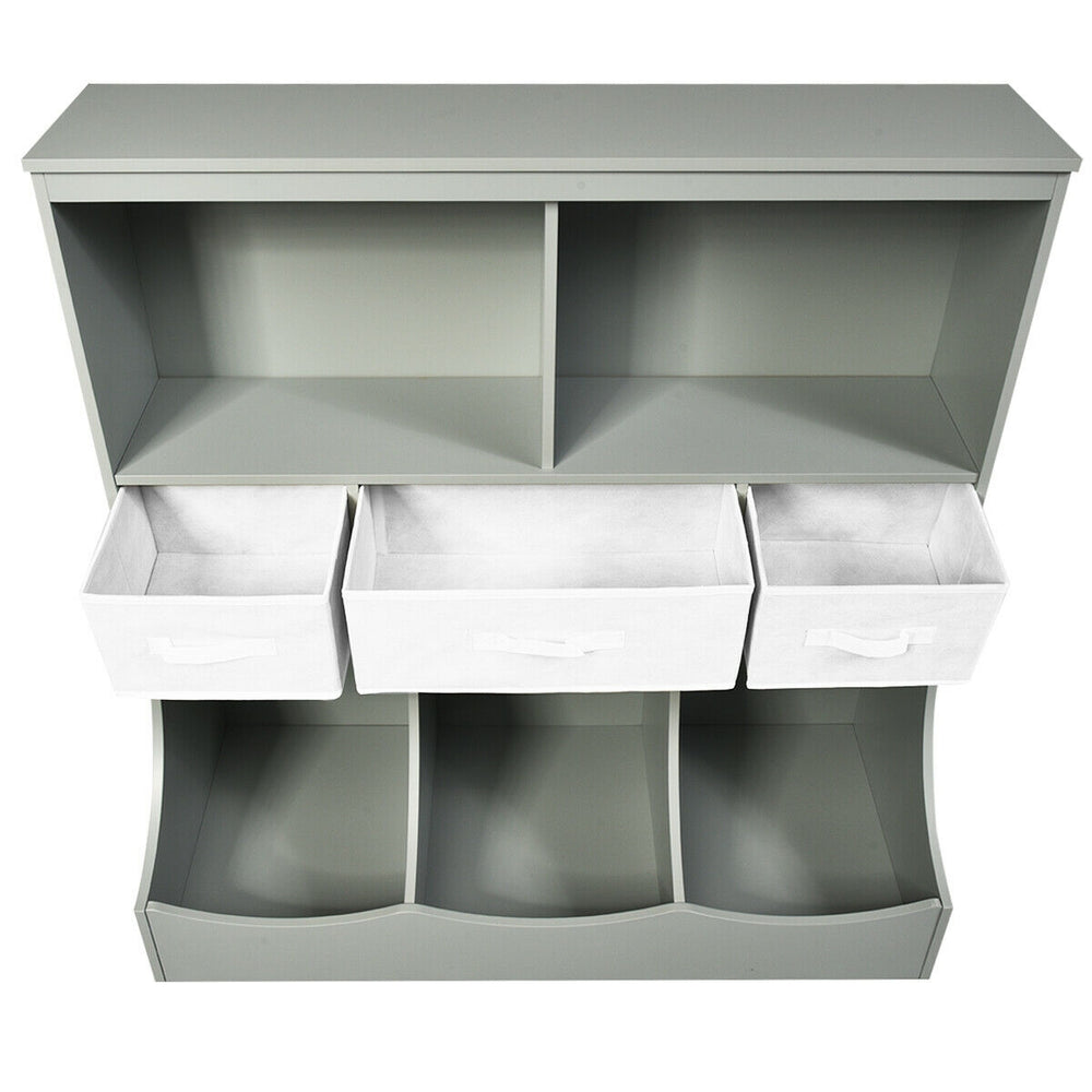 Freestanding gray storage organizer with two shelves, three non-woven drawers, and three bins for versatile storage.