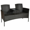 Modern patio conversation set featuring a built-in trapezoid coffee table and removable cushions for outdoor comfort.