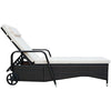 Cushioned outdoor recliner chaise lounge with adjustable backrest and wheels, made of weather-resistant PE rattan.