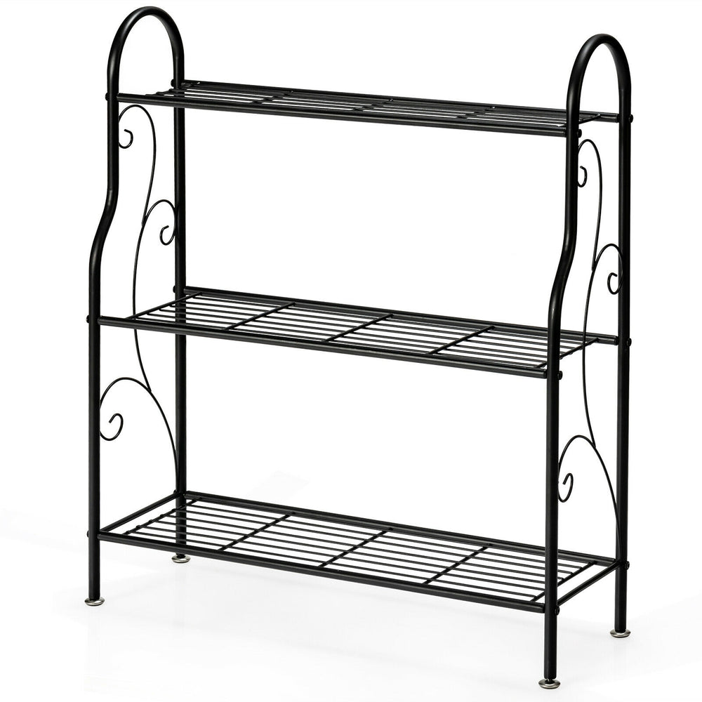 3-tier black metal plant stand with scrollwork design, perfect for organizing plants and enhancing garden decor.