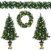Close-up of a pre-lit Christmas wreath adorned with red berries and LED lights, perfect for festive home decoration.