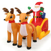 Close-up view of inflatable double deer and sled with Santa, showcasing LED lights and waterproof fabric for festive.