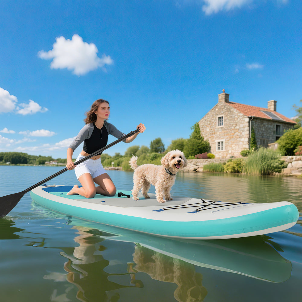 Inflatable 11-foot paddle board with a non-slip deck, center fin, and a girl paddling with a dog on a lake.