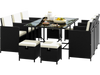 Space-saving 11-piece patio dining set with black wicker chairs and a tempered glass table, perfect for outdoor dining.
