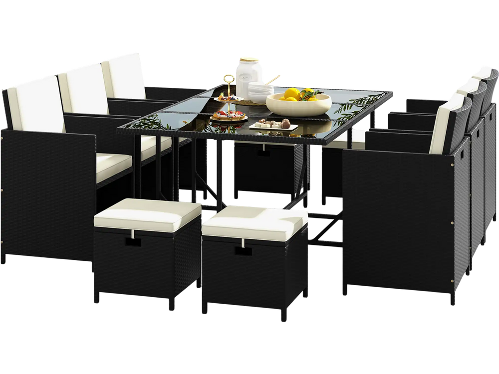 Space-saving 11-piece patio dining set with black wicker chairs and a tempered glass table, perfect for outdoor dining.