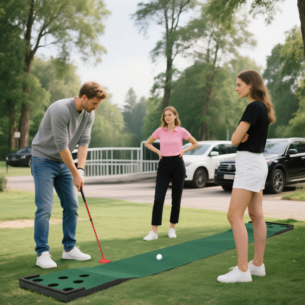 Putting green mat set with adjustable putters and golf balls, ideal for outdoor fun in backyard or office settings.
