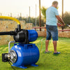 Blue 1200 W garden water pump with 150 ft lift rating, shown in use for irrigation on a lawn.