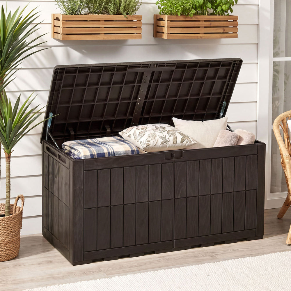 Brown 120 Gal outdoor deck box with lid, showcasing cushions, ideal for garden tools and extra seating.