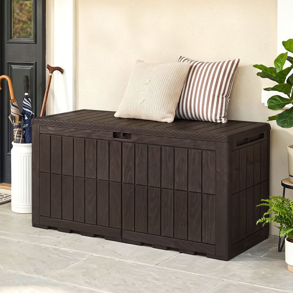Outdoor deck box in brown with lid, handles, and wicker texture, offering 120 Gal capacity for garden tools and seating.
