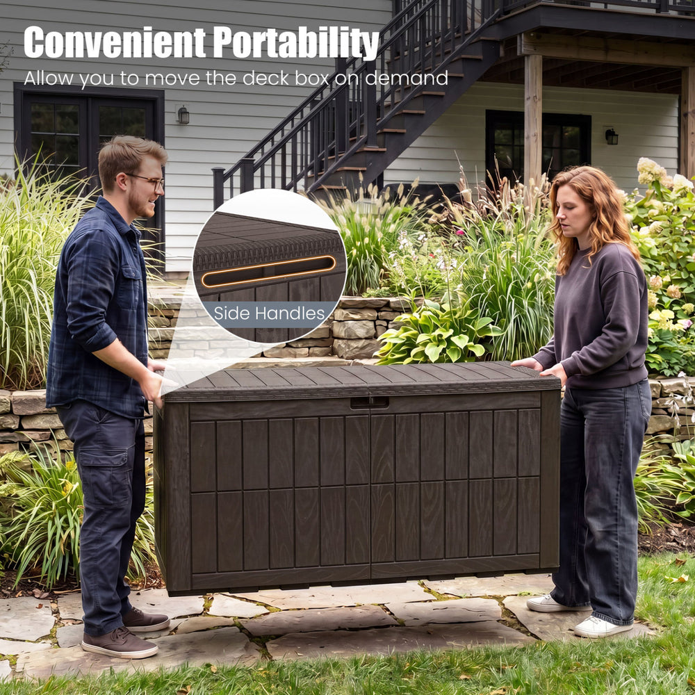Brown 120 Gal outdoor deck box with side handles, ideal for garden tools and pool supplies, shown being carried.