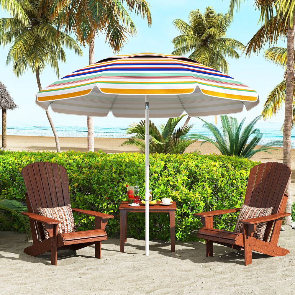 Colorful 6.5 feet beach umbrella with UPF50+ sun protection, set up beside two wooden chairs for seaside relaxation.