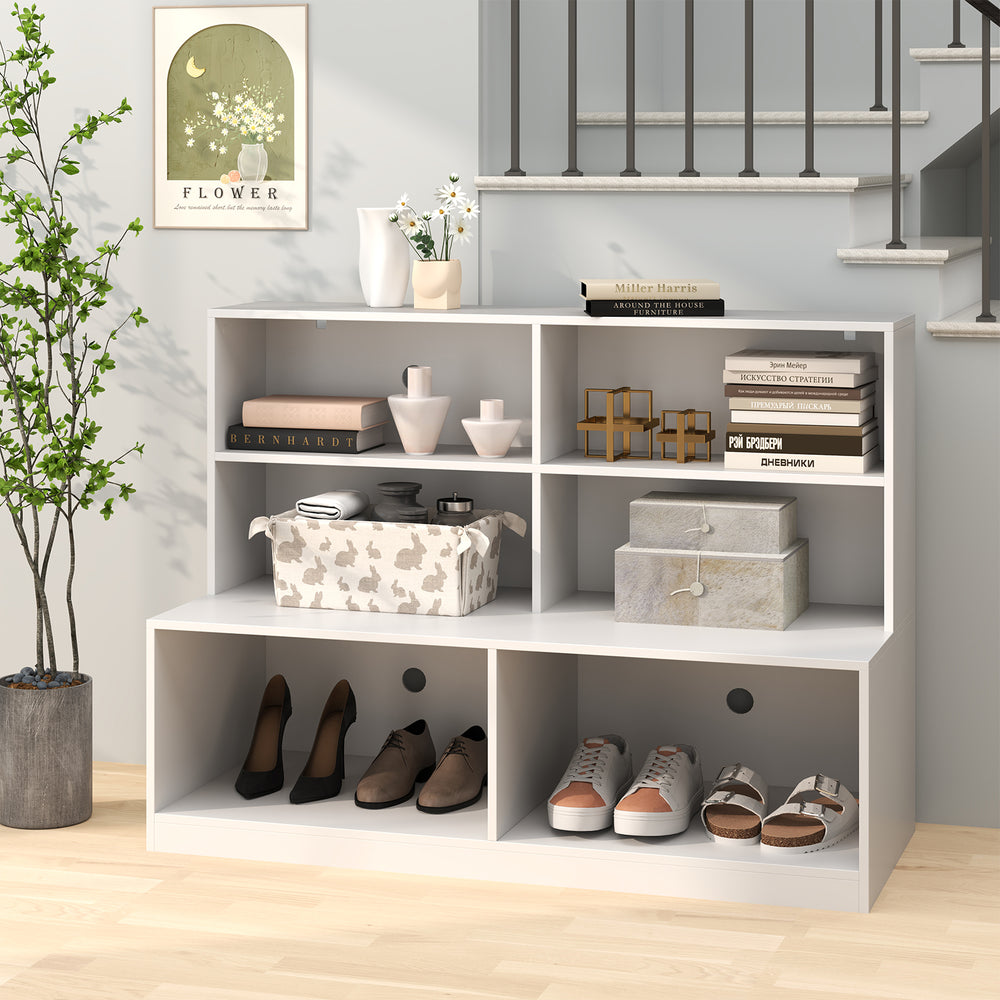 White entryway shoe cabinet with 4 storage cubes and 2 compartments, ideal for organizing shoes and accessories.