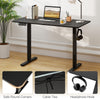 Ergonomic electric standing desk in black, 48" x 24", with memory settings, rounded corners, and headphone hook for.