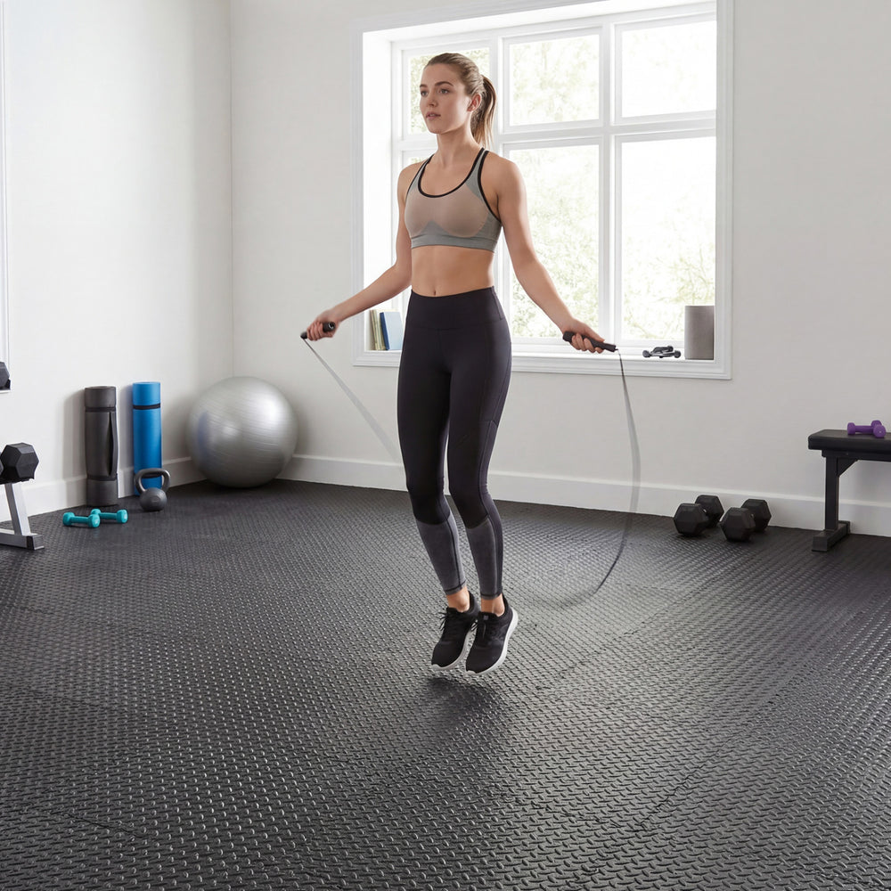 Black EVA foam puzzle exercise floor mats, ideal for home workouts, yoga, and protecting floors from damage.