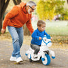 Child riding a 12V unicorn toy with training wheels, designed for stability and fun, perfect for outdoor play.