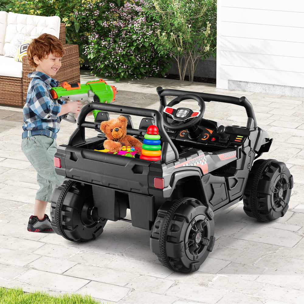 Battery-powered electric vehicle in black with remote control, featuring a storage compartment and adjustable seat for.