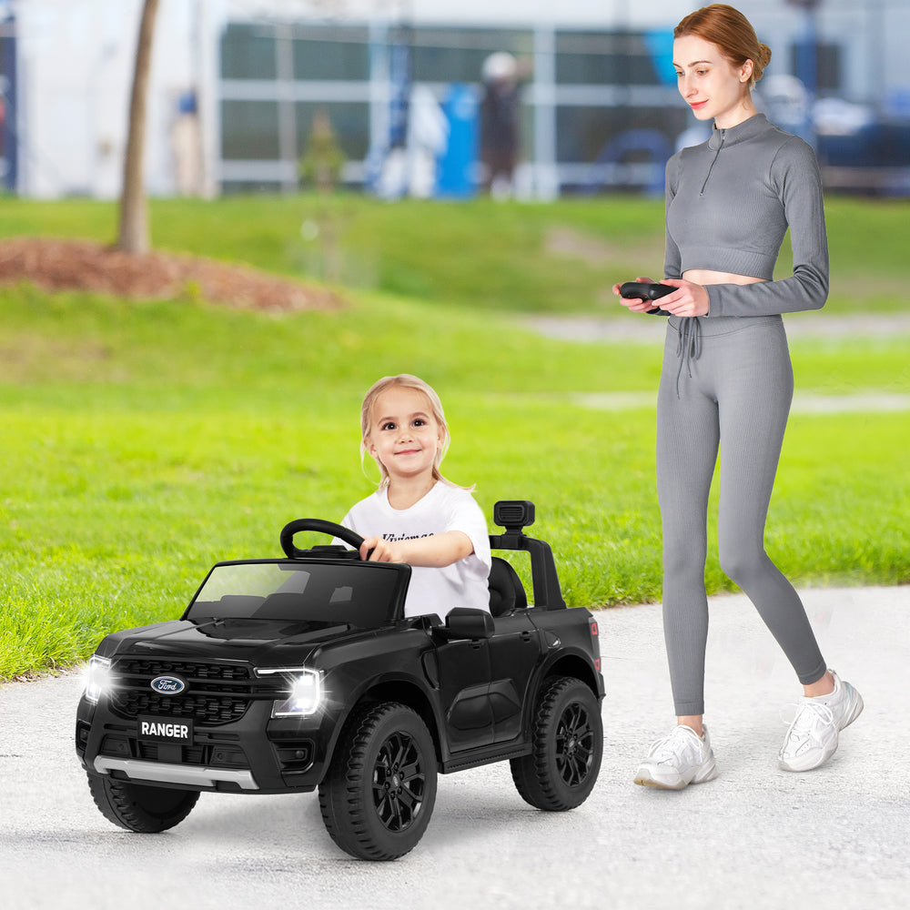 Black 12V electric kids ride-on Ford Ranger with remote control, featuring a multimedia player and safety belt.
