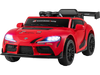 Red 12V kids electric car shown from the side, with bright headlights and Toyota styling for outdoor rides.