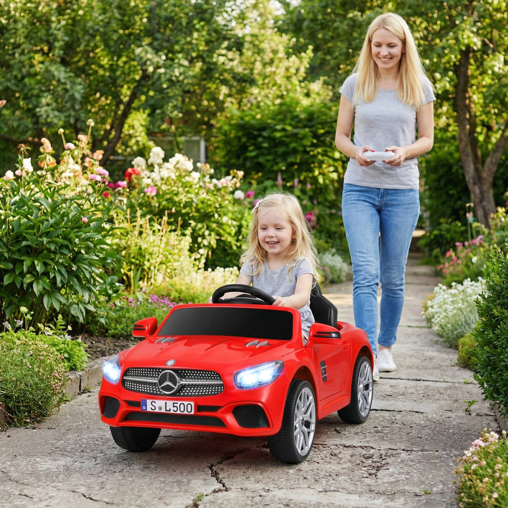 Red licensed Mercedes-Benz kids ride-on car with remote control, LED headlights, and music, perfect for outdoor fun.