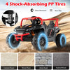 4 shock-absorbing PP tires on a black 12V kids ride-on truck, designed for smooth off-road driving and safety.