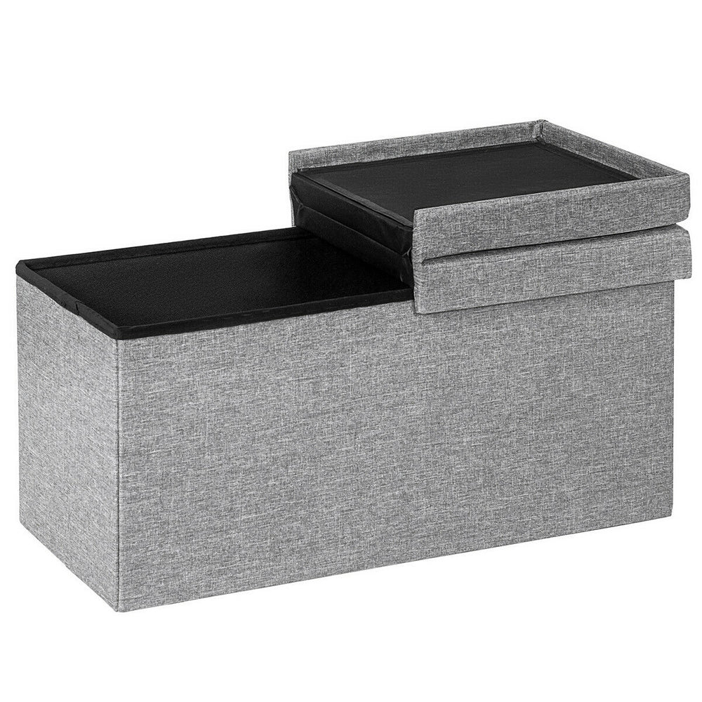 Light gray folding storage ottoman with lift top, showcasing soft faux linen fabric and a convenient flip-top design.