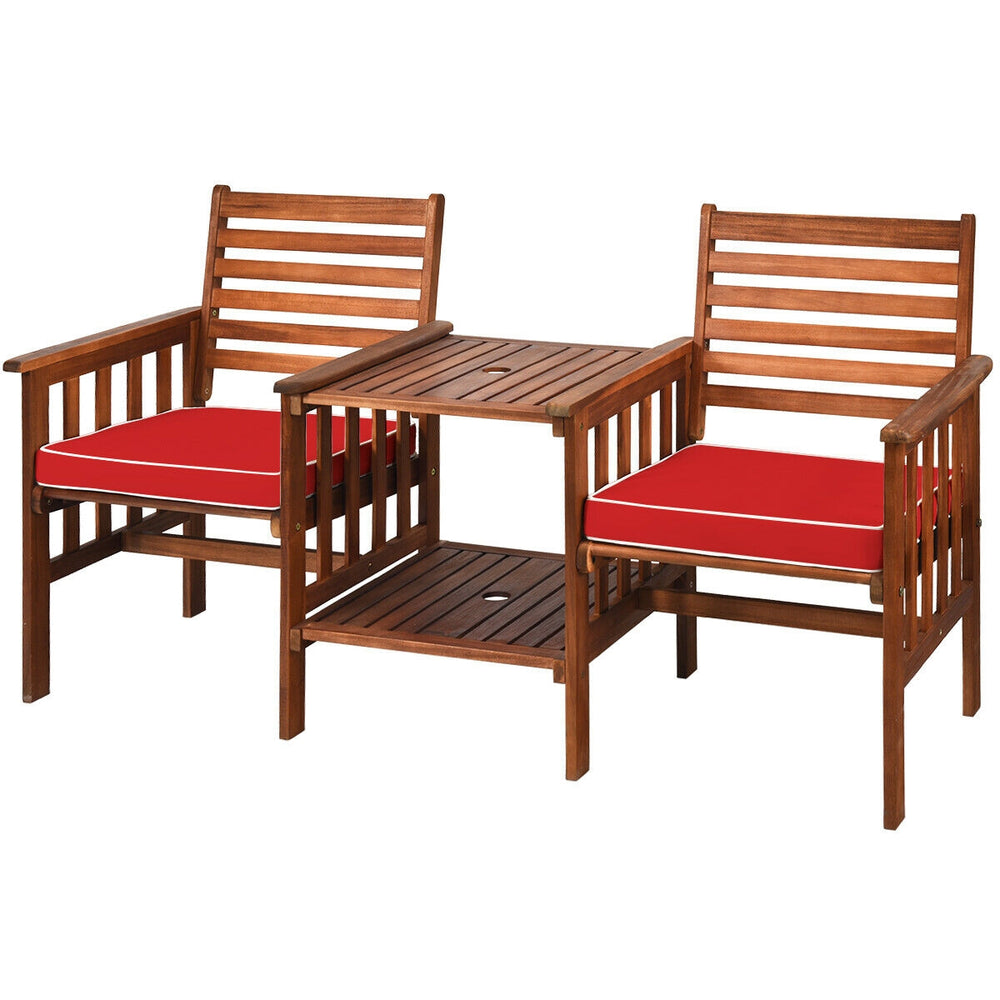 Acacia wood loveseat set with red cushions, featuring a coffee table and umbrella hole, ideal for outdoor patios.