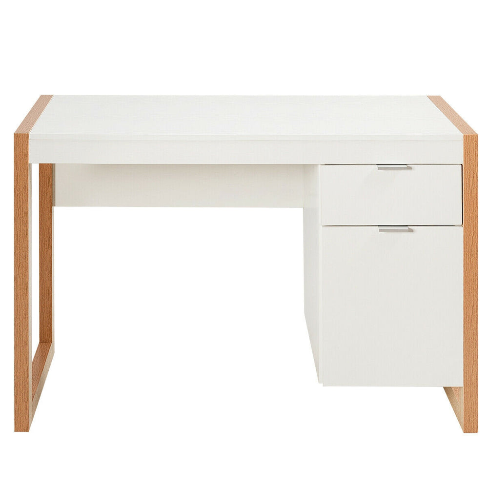 Modern white computer desk with a large drawer and cabinet, perfect for study or work in a stylish home office.