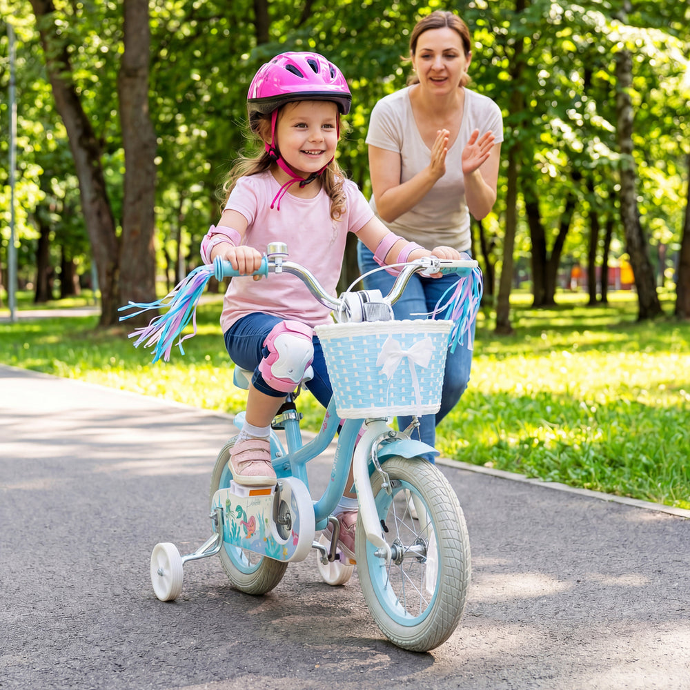Kids bike with adjustable seat and handlebar, blue Princess of the Sea theme, featuring a basket and colorful streamers.