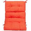 Orange tufted outdoor patio chair seating pad with a three-fold design, providing comfort and secure string ties for.