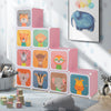 Colorful 12 cube kids wardrobe closet in pink with animal doors, ideal for playful storage in children's rooms.